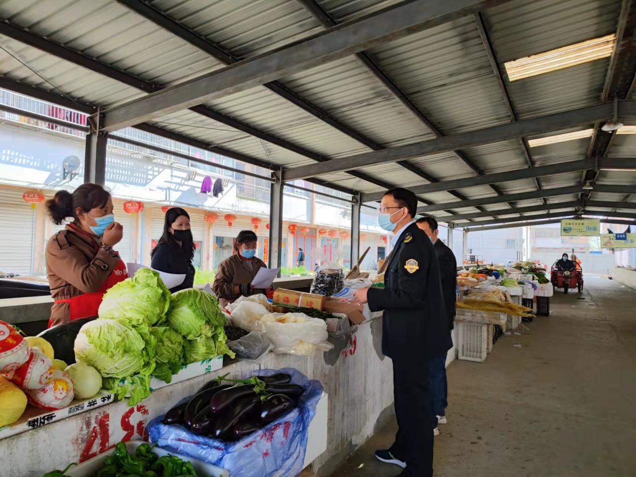 一抹市监蓝 辉映党徽红